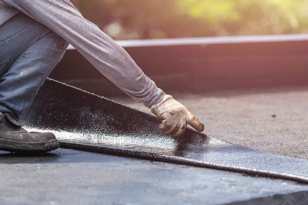 Professional Waterproofing technician working in Breckenridge, MI